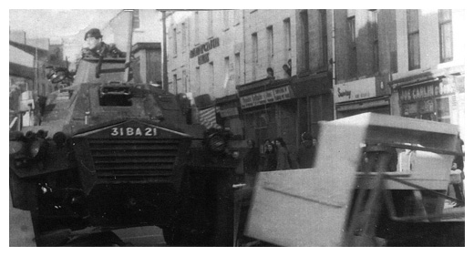 British troops clear a Civil Rights barricade in Newry centre.