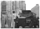 The British Army riot squad prepare to attack demonstrators who were protesting against the shooting of three unarmed young men in Newry town centre.