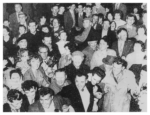 Scenes of jubilation at the border as the stewards, Paddy Quinn, Maurice Mathers, P.J. Cunningham and John Rooney hold back the crowd of Down fans.