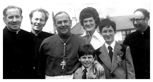 Confirmation day at Crossmaglen with Cardinal Tomas O'Fiaich, Fr Kevin Moran, Fr John McGennity, Mrs Nan Morris, her sons and Fr Sweeney.