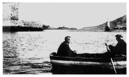 Veteran Omeath boatman Eddie O'Hanlon makes his last crossing of Narrow Water, passenger seaman Kevin Holland.
