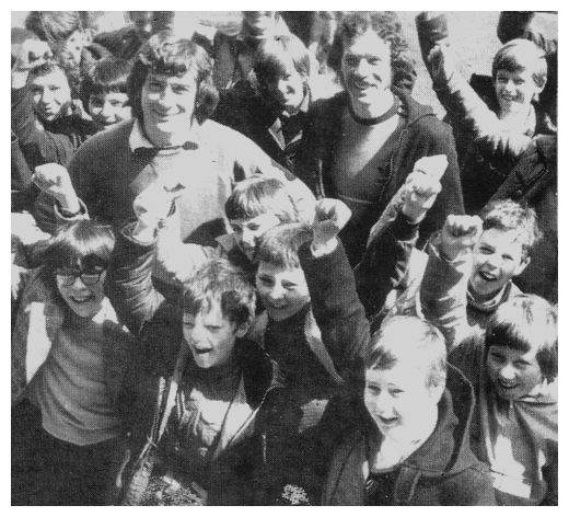 Pat Jennings and his brother Brian, former sportsmaster at St Paul's High School with pupils at Whitehart Lane.